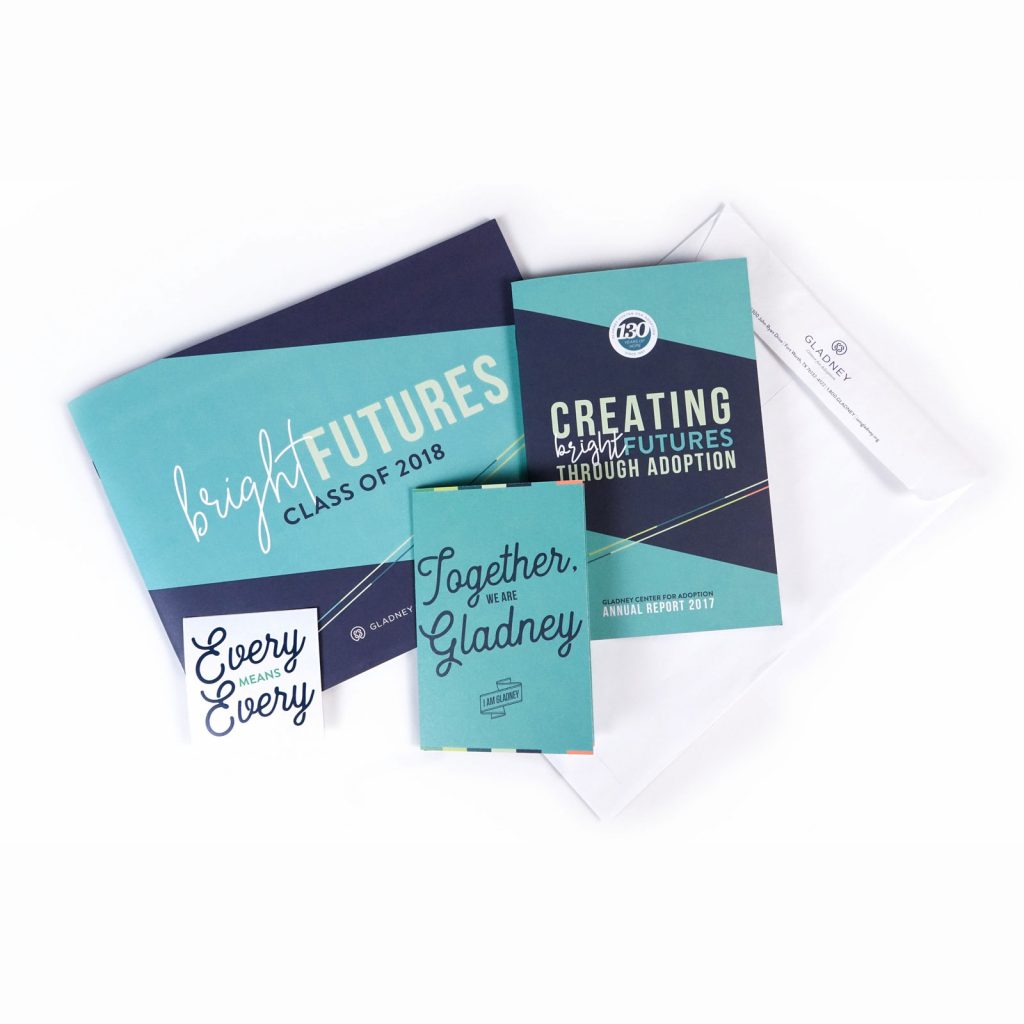 A portfolio mockup with cards, envelopes, and a card featuring the words 'creative futures'.
