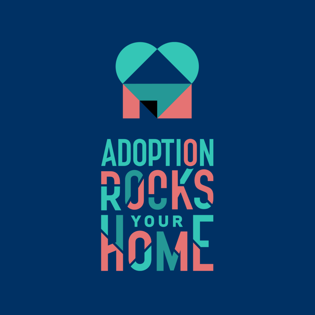 Heart-shaped house icon with the text "Adoption Rocks Your Home" in bold, colorful lettering on a dark blue background, highlighting the inspiring message promoted by Gladney Center.