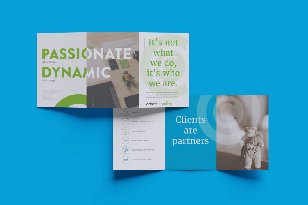 Two open brochures on a blue background display business-related messages such as "PASSIONATE DYNAMIC," alongside the Ardent logo, reinforcing the brand evolution and identity with statements like "Clients are partners.