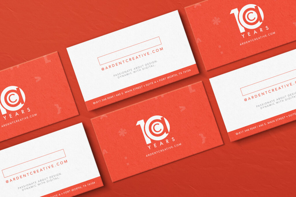 Six business cards with a red and white design showcase "10 Years," "ardentcreative.com," contact details, and reflect the brand evolution of Ardent through modern, minimalistic style and thoughtful logo design.